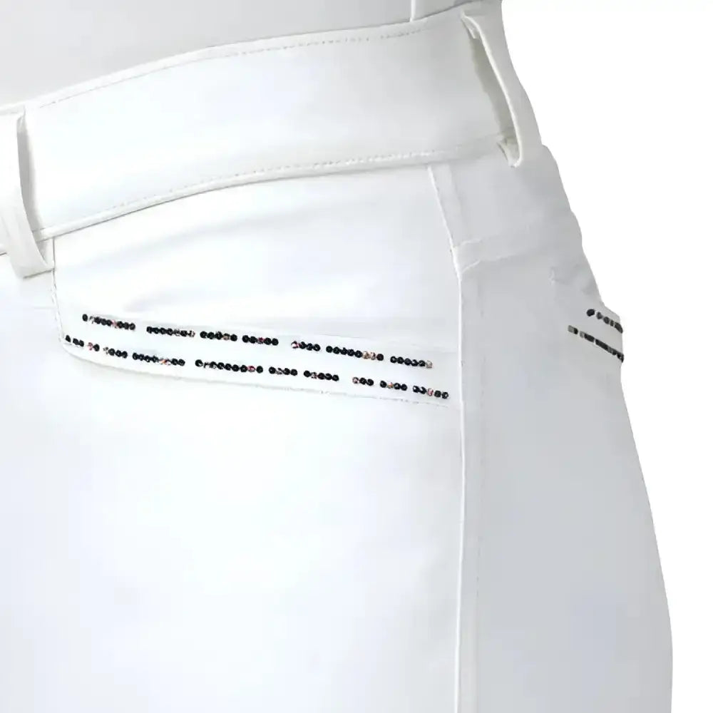 White roka rose breeches with sleek fabric and black rhinestone trim on waistband perfect for equestrian style
