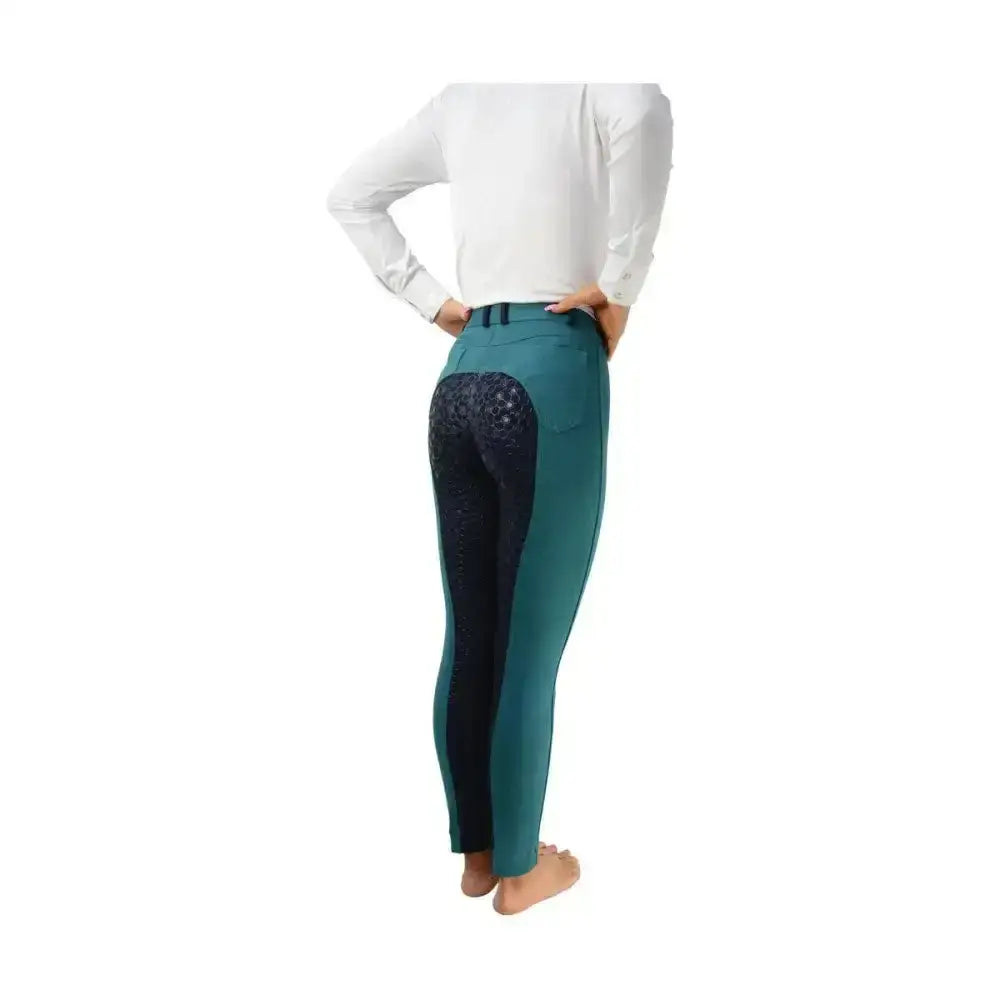 Back view of teal and black equestrian saxby silicone jodhpurs with lace panel perfect for everyday riding