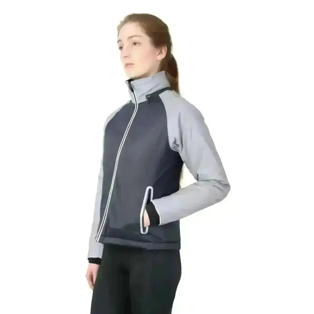 A sleek hy equestrian silva flash waterproof padded jacket with a navy body and gray sleeves with white zippers