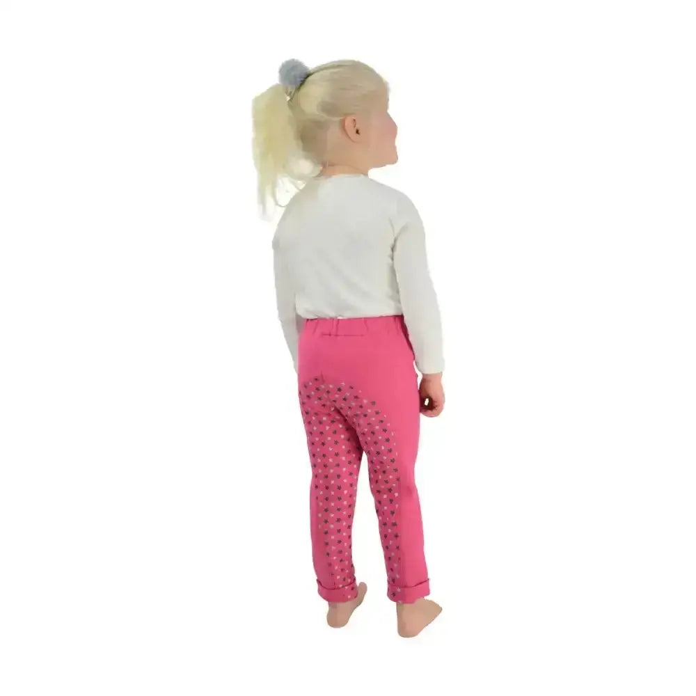 Pink hy equestrian star tots jodhpurs with dark dot pattern on lower legs and cuffed hems hard wearing jodhpur style