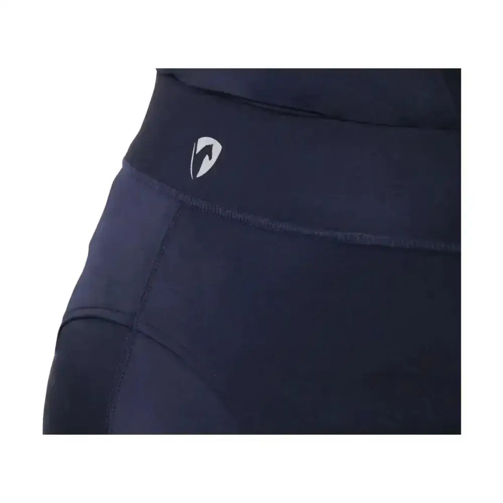 Black high-waisted synergy riding tights with a white waistband logo designed to allow unrestricted movement for equestrian use
