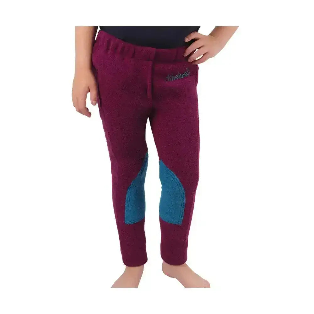 Maroon fleece riding pants with teal knee patches and logo on waistband from hy equestrian thelwell collection pony fleece tots jodhpurs