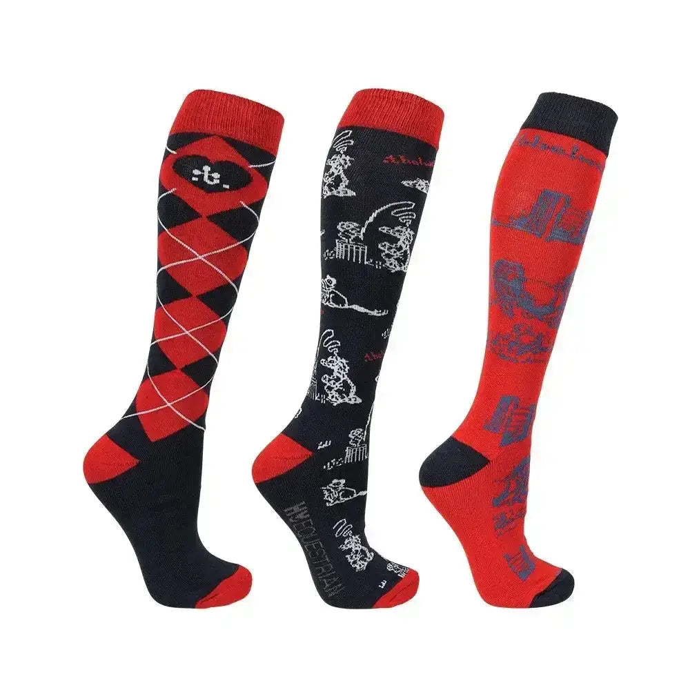 Set of three knee-high socks from hy equestrian thelwell collection with bold argyle, cartoon prints, and vibrant red designs
