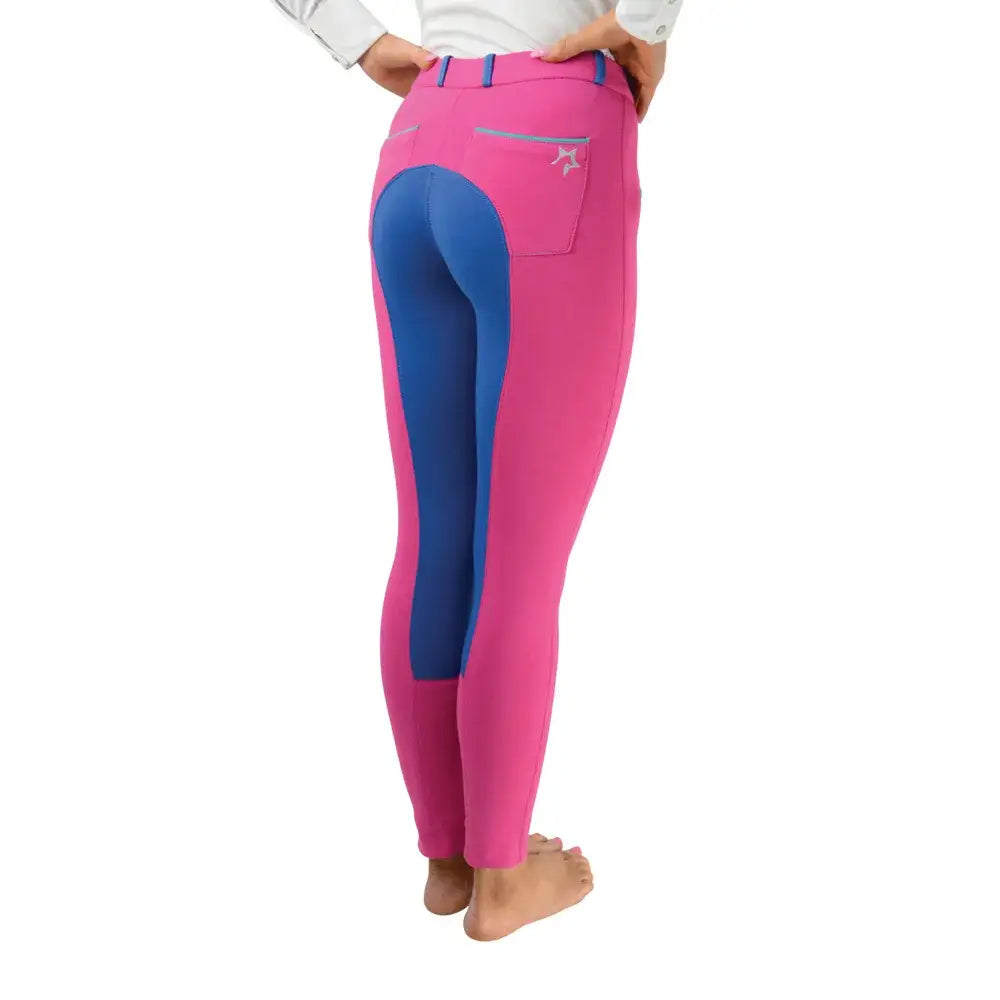 Back view of bright pink and royal blue equestrian zeddy mizs jodhpurs with star logo on back pocket