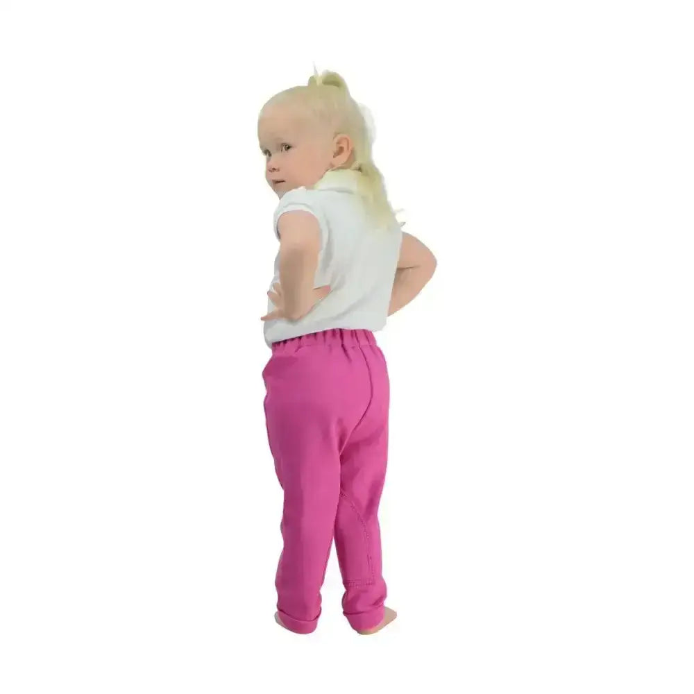 Toddler wearing bright pink soft fabric equestrian zeddy tots pull-on tots jodhpur with elastic waistband
