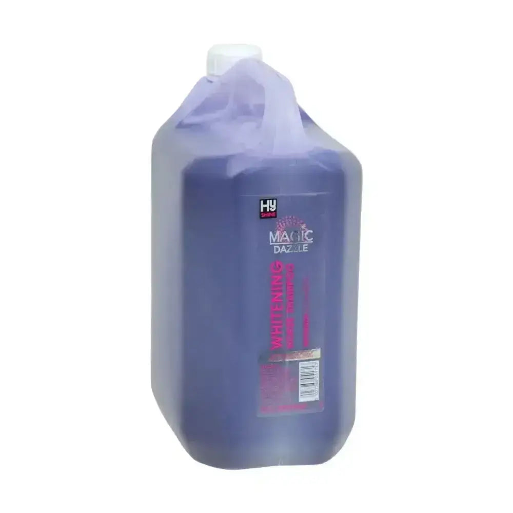 A translucent purple plastic jug with white cap labeled magic dazzle containing 5 liters of dazzle whitening shampoo