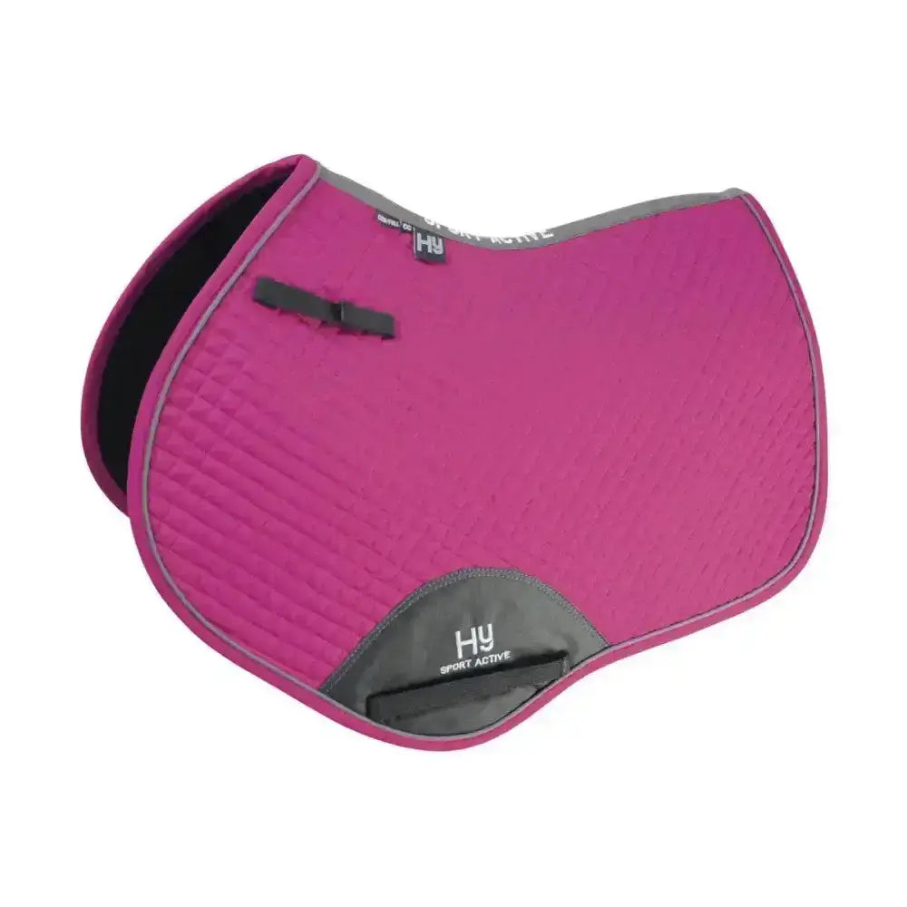 A vibrant pink hy sport active close contact saddle pad with quilted texture gray trim and black inner lining