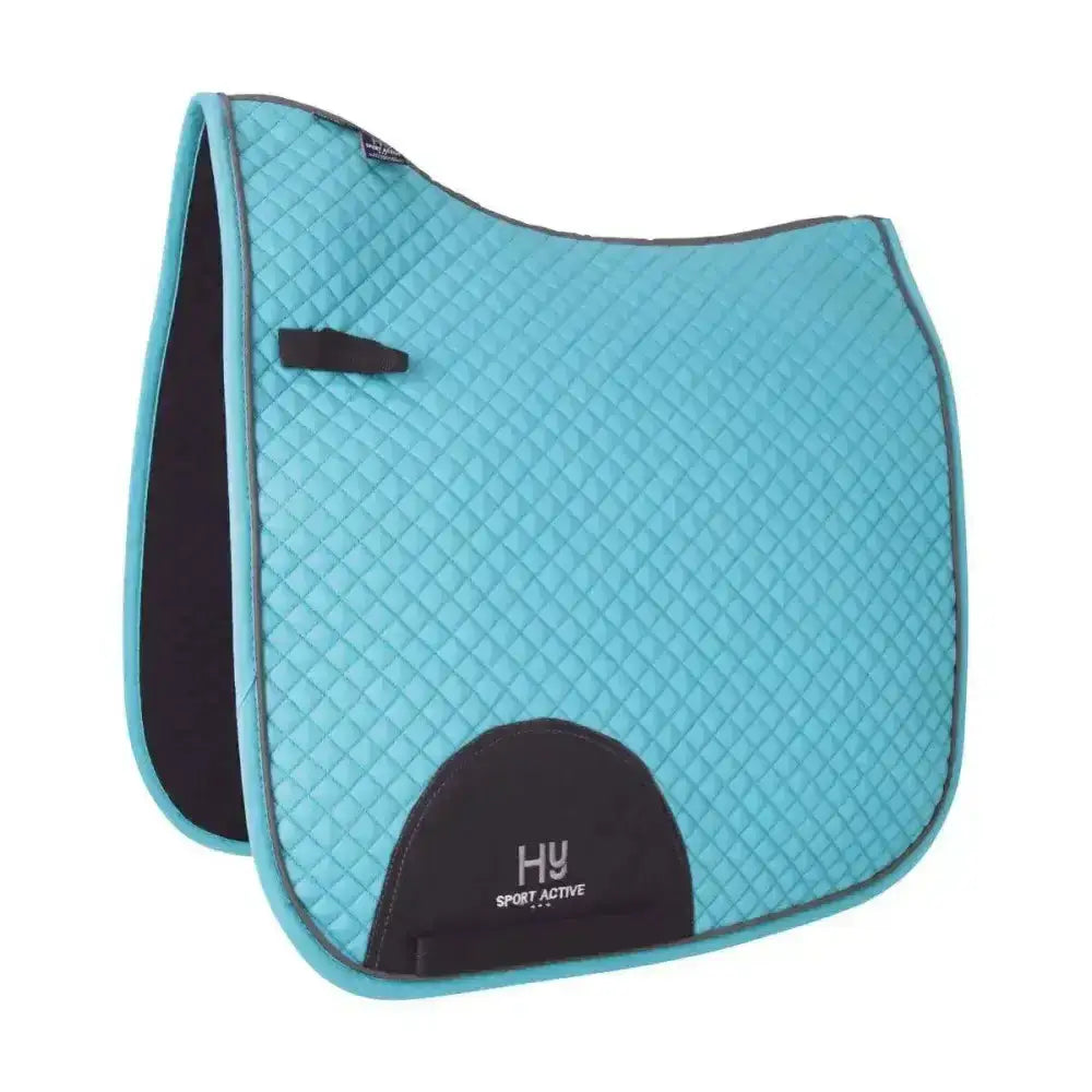 Turquoise quilted hy sport active dressage saddle pad with black trim and signature hywither cut logo patch