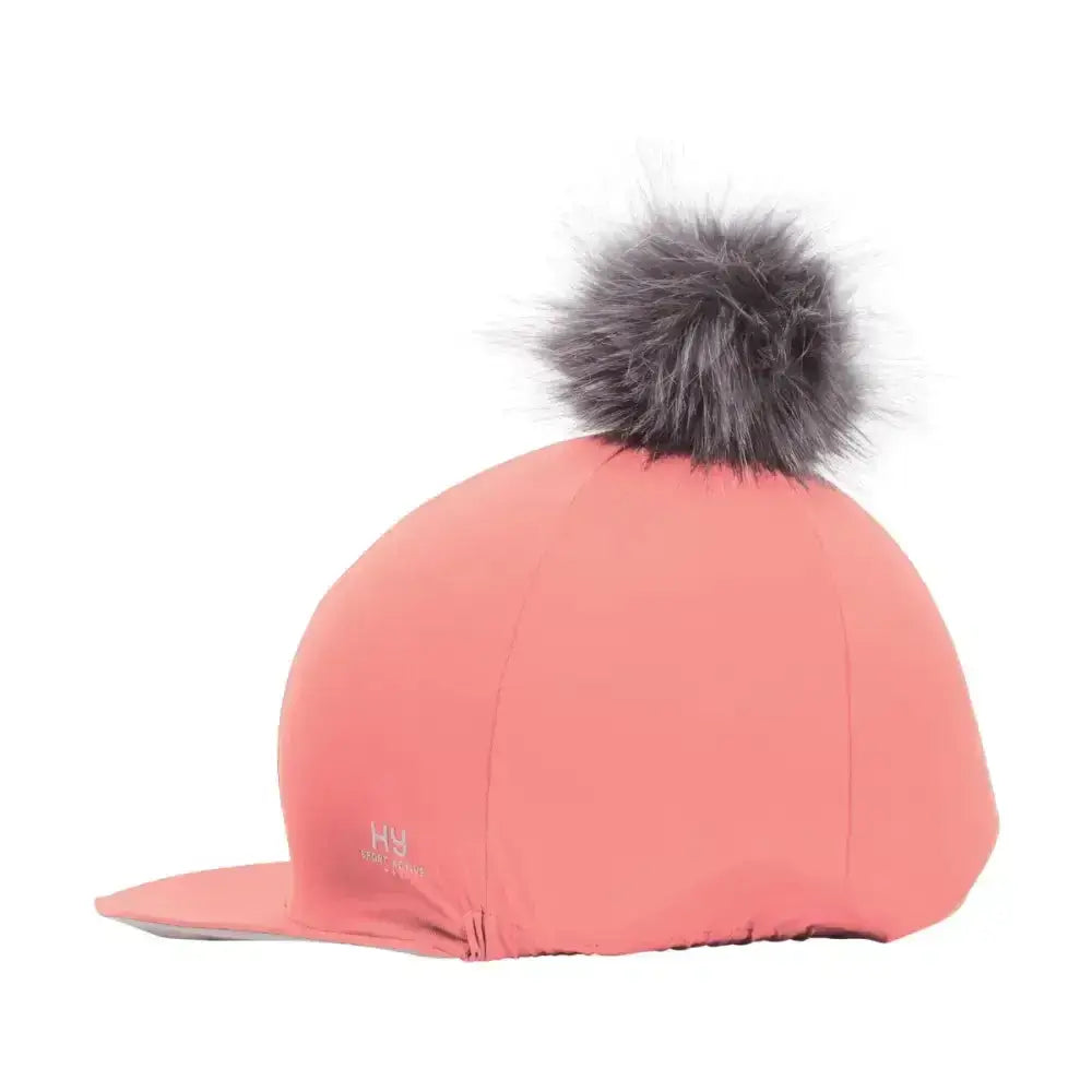 Coral helly hansen hy sport active hat with gray faux fur interchangeable pom pom for equestrian use