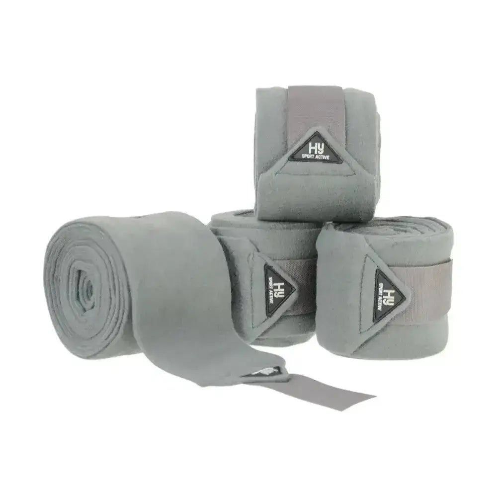 Gray hu sport active luxury bandages made of soft fabric with reinforced straps and triangular brand logos designed for horses