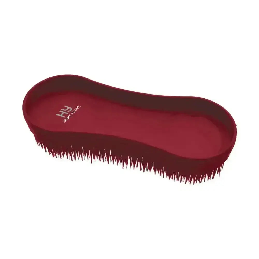 A sleek deep red hy sport miracle grooming brush with smooth plastic handle and dense bristles for grooming