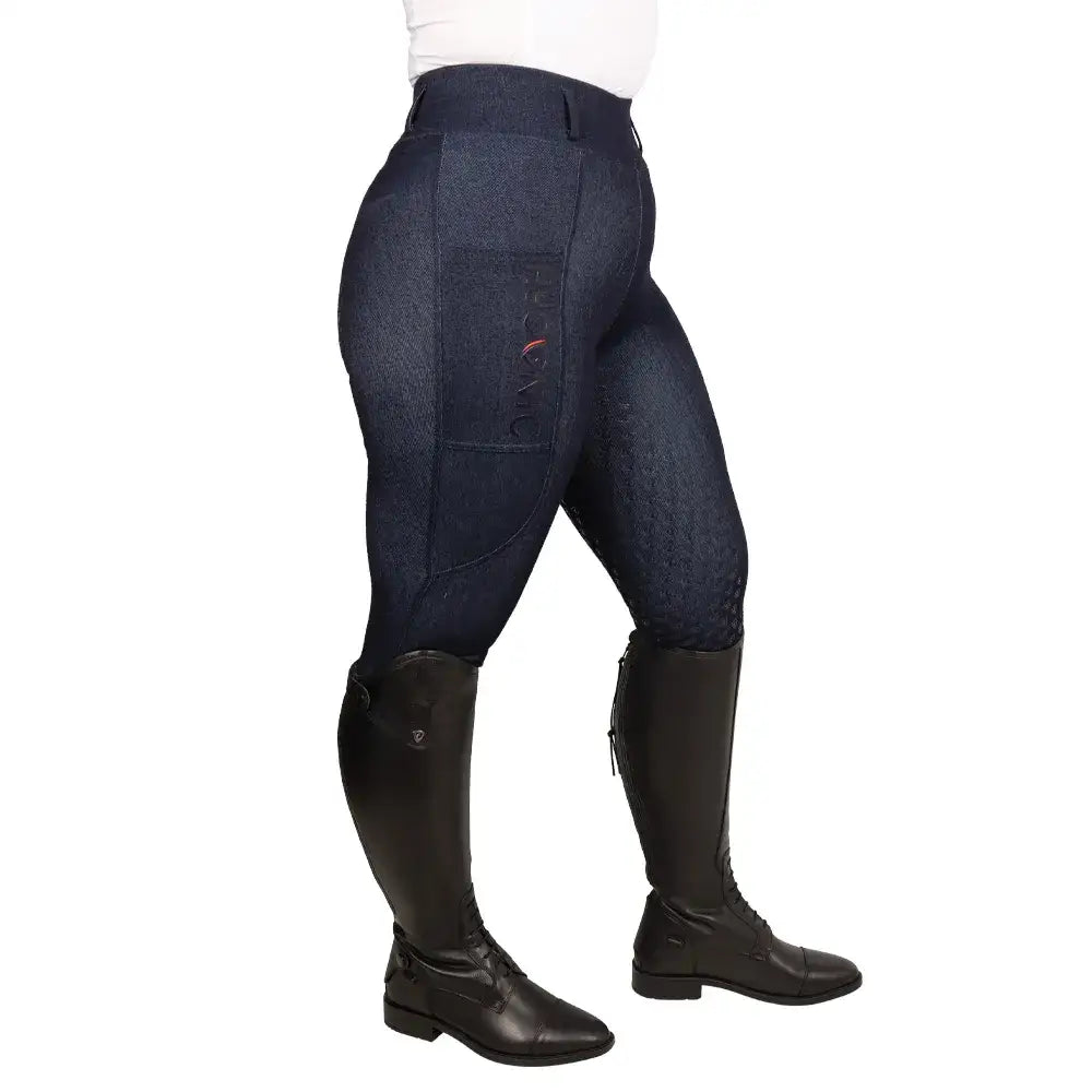 Back view of navy blue hyconic valloria denim riding tights with subtle texture and branded patch on pocket