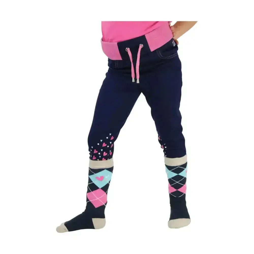 Navy blue children’s pony collection denim pull pants with pink and blue argyle riding skins and heart cuffs