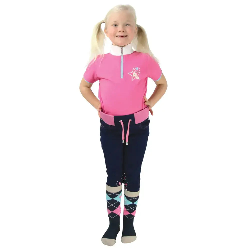 Pink short-sleeved equestrian show shirt from i love my pony collection with white star logo and silver zipper detail
