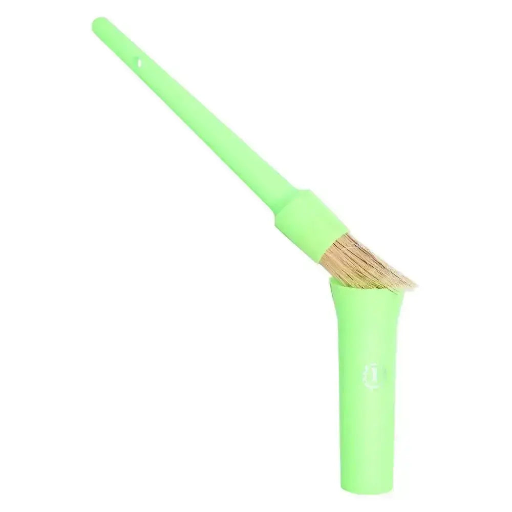 Bright green plastic-handled imperial riding irhhoof oil brush with natural bristles and matching protective cap for riding irhhoof oil