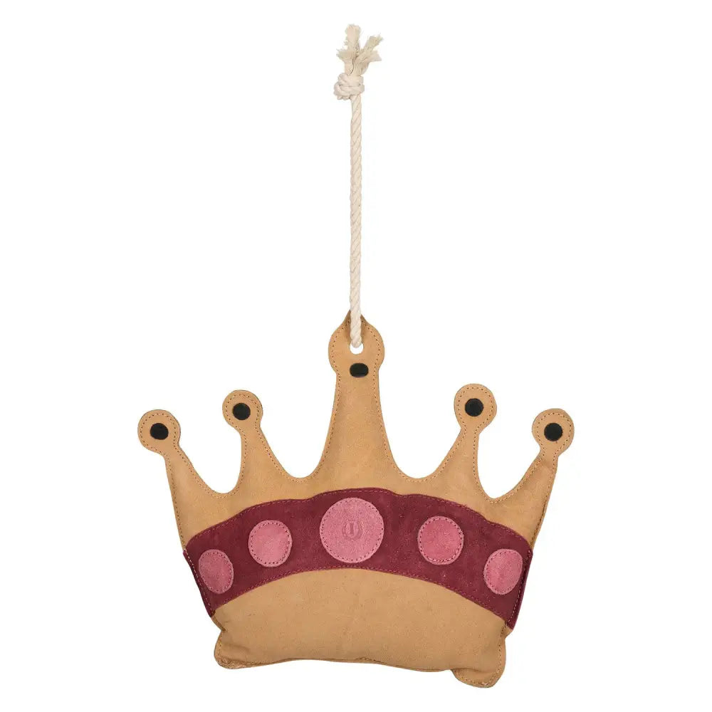 A soft tan leather irhstable buddy crown with a maroon band pink patches and black embroidered dots for imperial riding