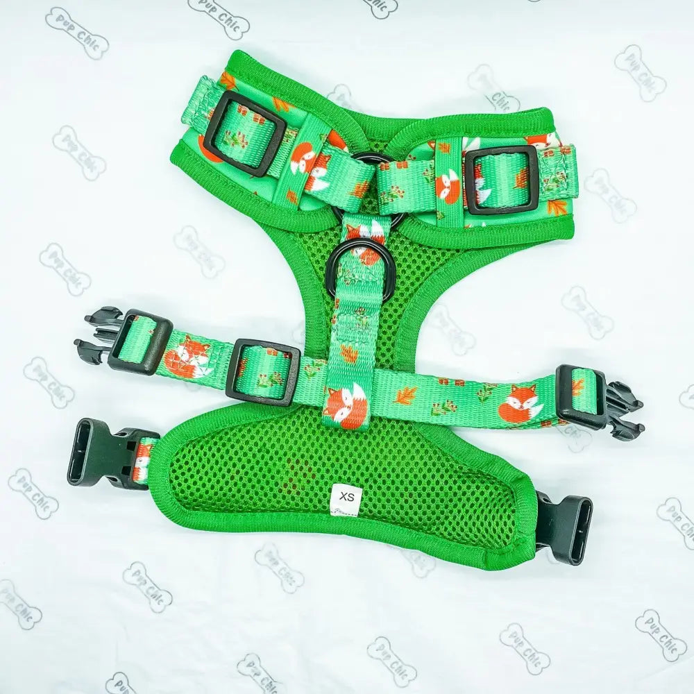 Green mesh inquisitive fox xxs puppy harness with orange fox print and black buckles for small breeds