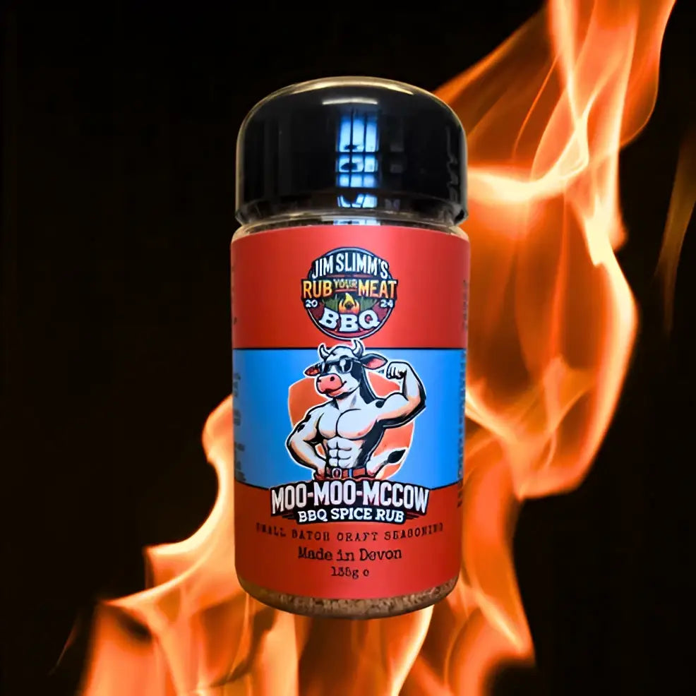 A vibrant red and blue jar of jim slim barbecue moo-moo-mccow spice rub with a cartoon cow mascot on the label