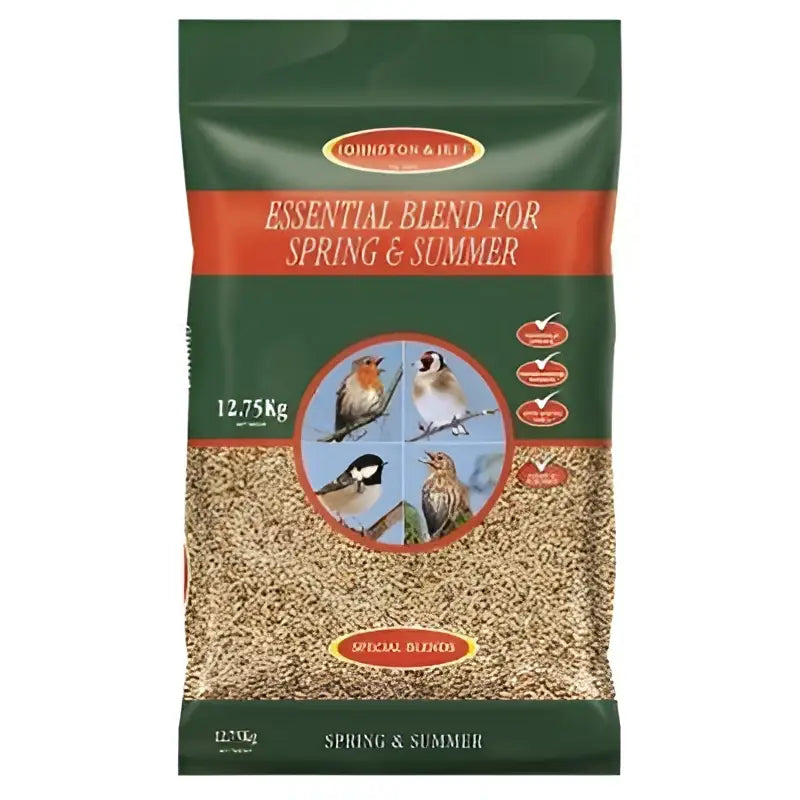 A green and red packaged johnston and jeff summer mix bird food with a clear window showing wild birdseed blend