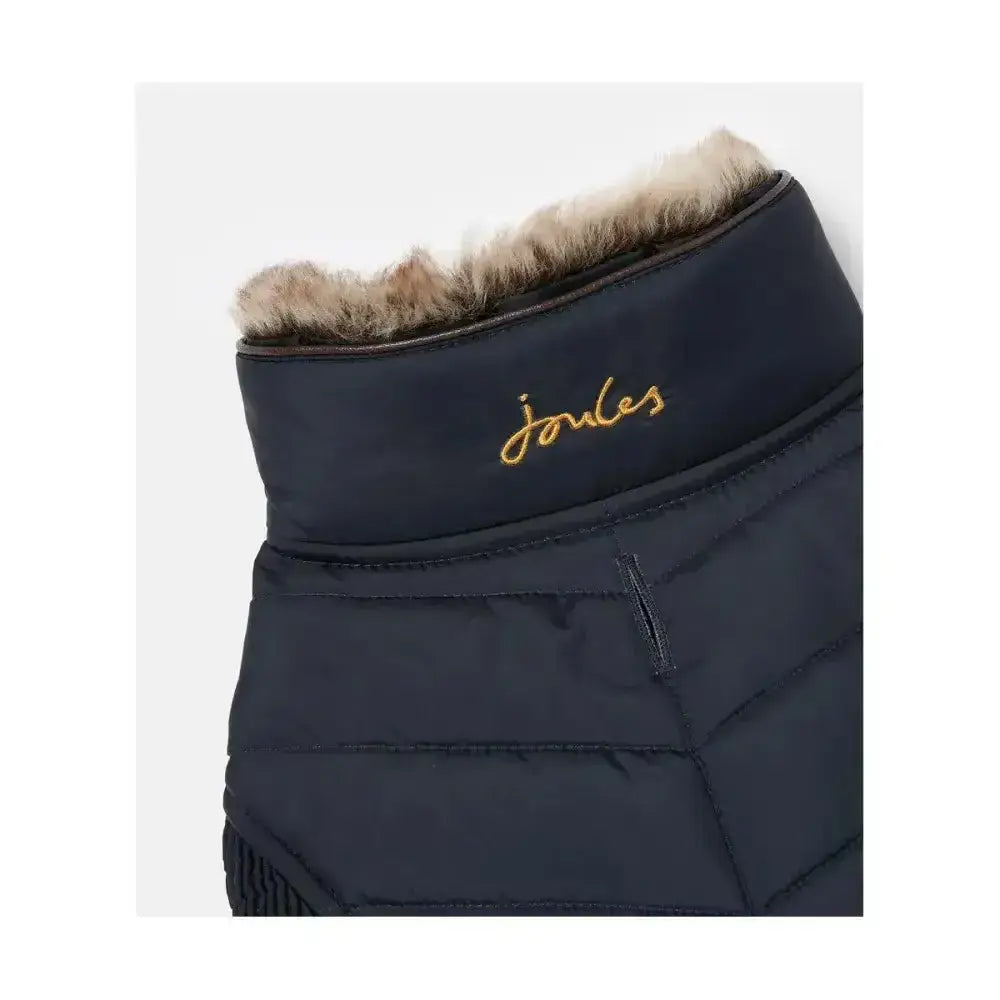 Dark navy quilted joules cherington dog coat with plush tan fur lining and gold embroidered logo for dog apparel