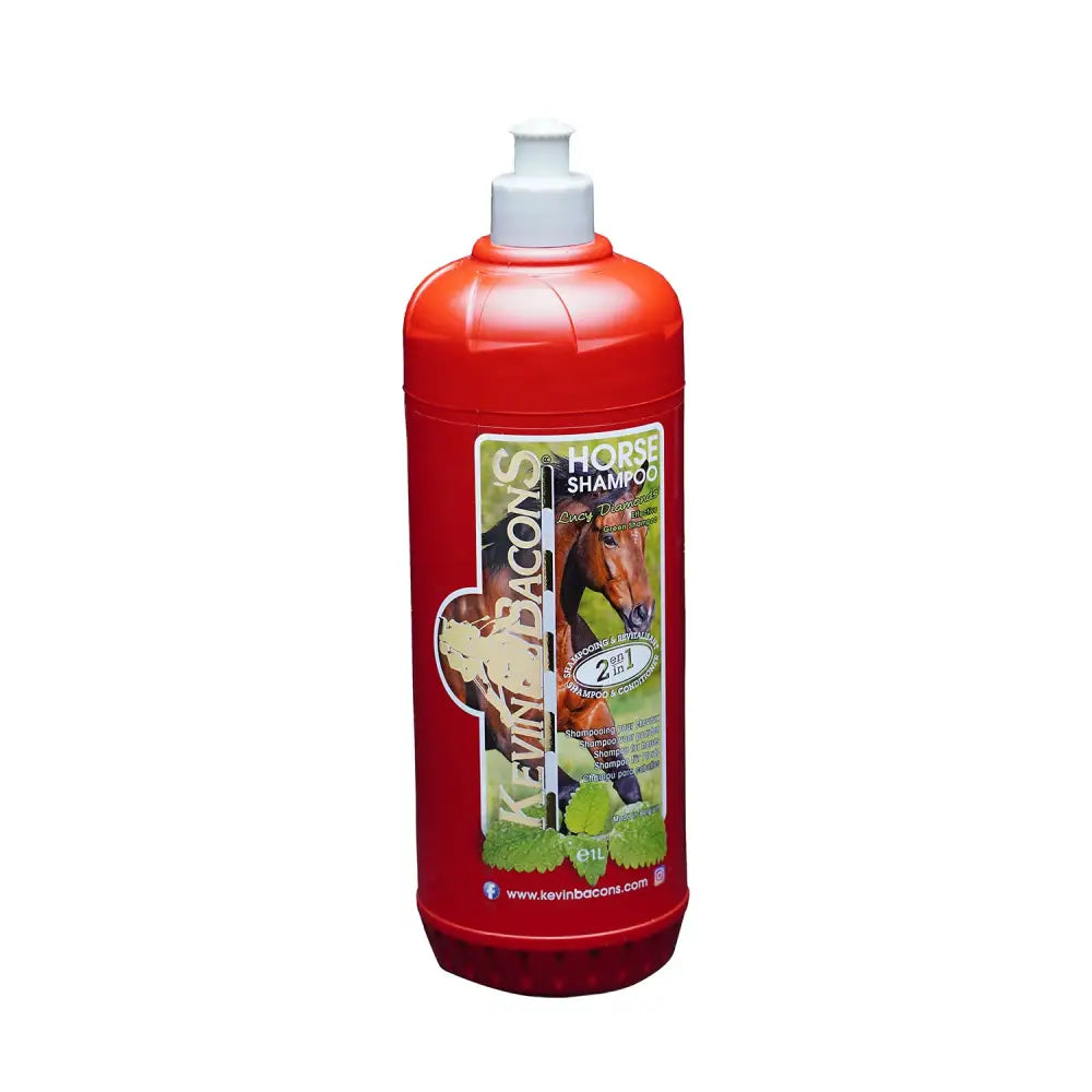 Red plastic bottle of kevin bacons lucy diamond shampoo 2-in-1 with white pump and green leafy label design