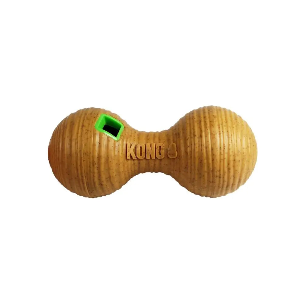 Tan ribbed kong bamboo feeder dumbbell dog toy with green rectangular opening for irresistibly unpredictable play