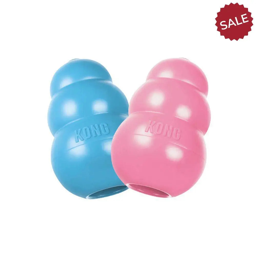 Blue and pink kong puppy medium dog toys with glossy durable plastic finish for active chewers