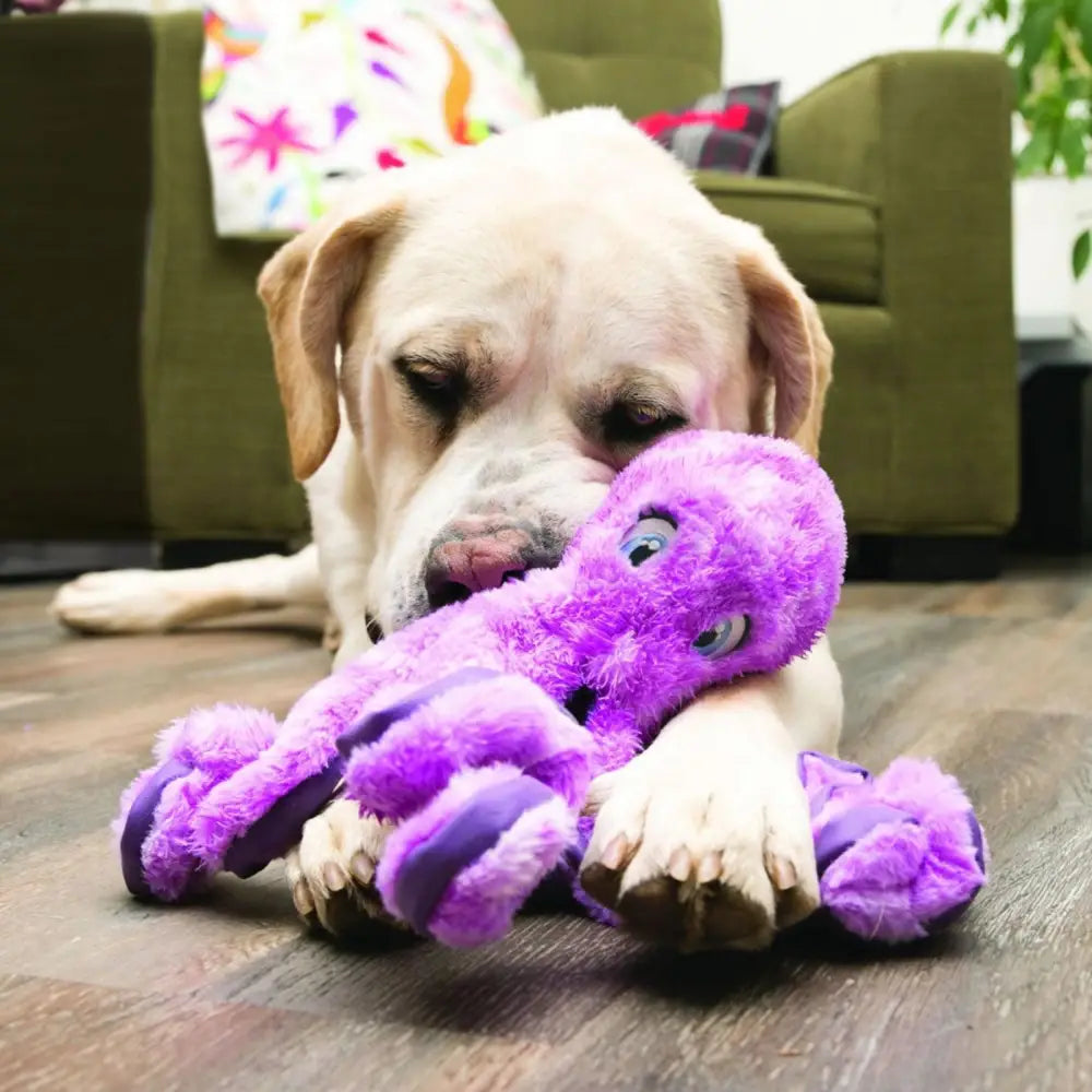 Purple plush kong softseas octopus toy with blue eyes and striped tentacles for satisfying natural thrashing fun