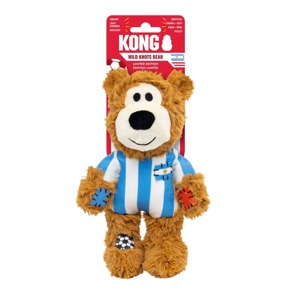 A plush brown kong wild knots sport arg bear argentina wearing a blue white striped soccer jersey with embroidered paws