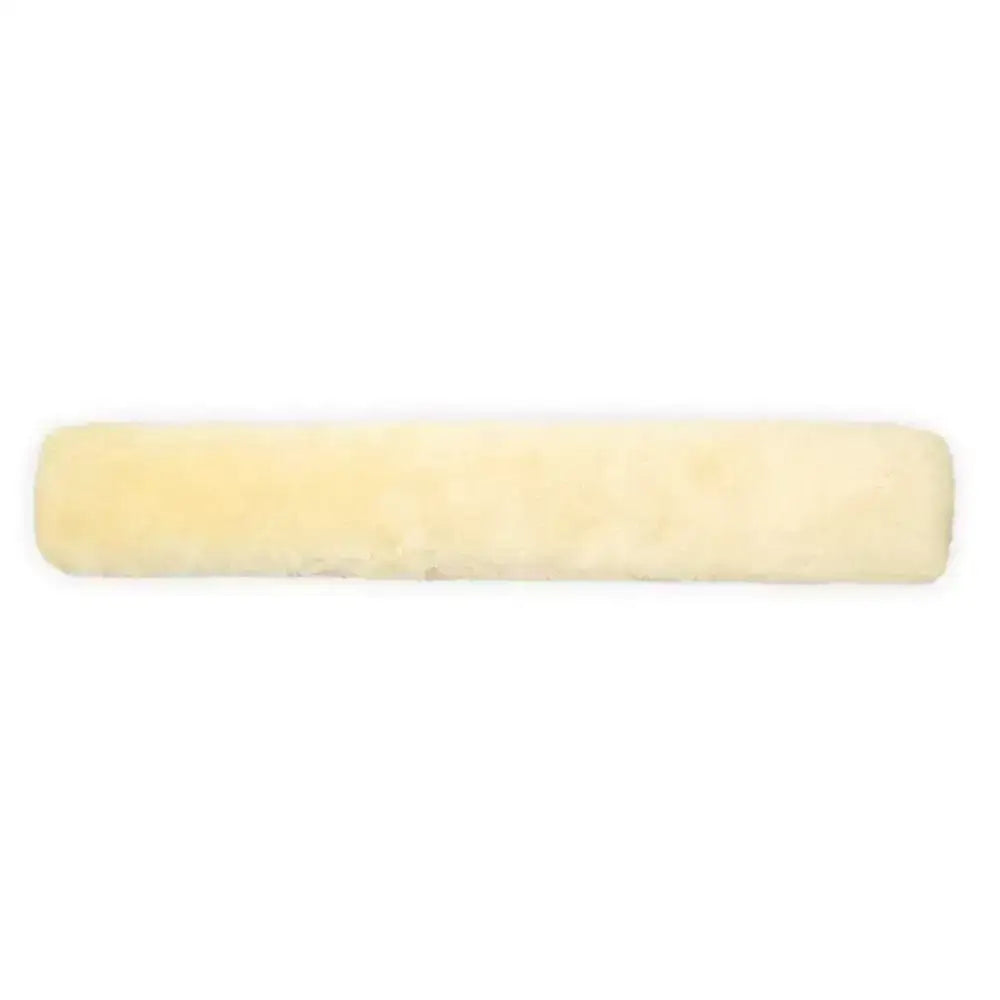 Cream-colored plush lambswool girth sleeve 60x12 natural with soft fluffy texture for comfy horse girth use