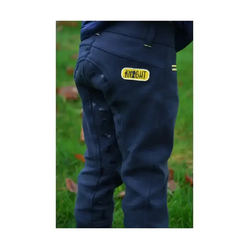 Dark blue lancelot full silicone breeches by little knight with a yellow patch and contrasting yellow top-stitching