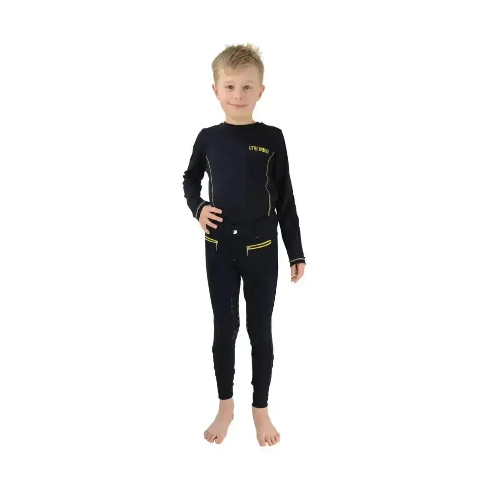 Black long-sleeved children’s wetsuit with neon yellow zipper and little mermaid branding paired with navy blue silicone breeches with contrasting yellow top-stitching