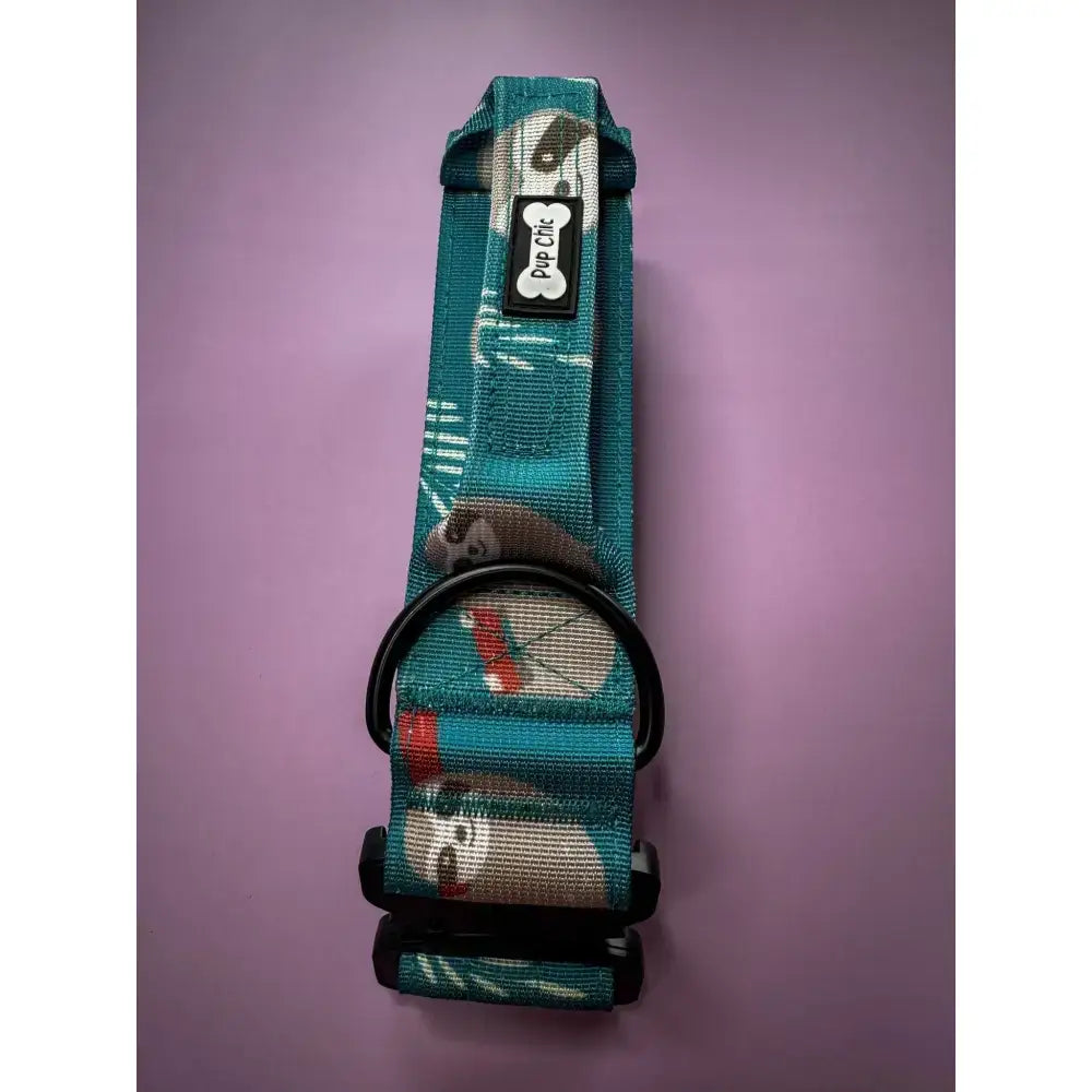 Teal patterned lazy sloth tactical dog collar with black hardware and mint green base featuring pup chic tag