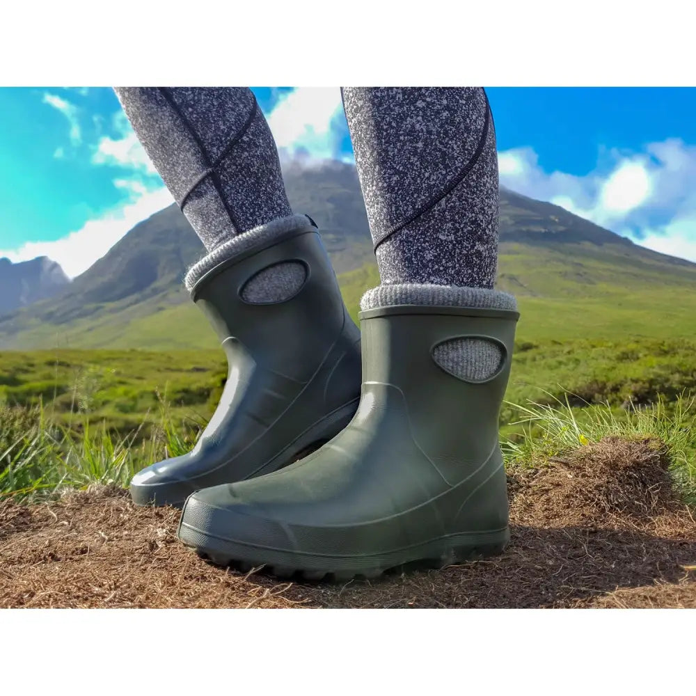 Olive green lbc ultralight ankle boots with gray knit cuffs and oval cutouts made with direct injection moulding