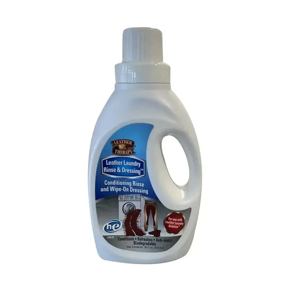 White plastic bottle of leather therapy leather laundry rinse and dressing with blue label and white cap for leather care