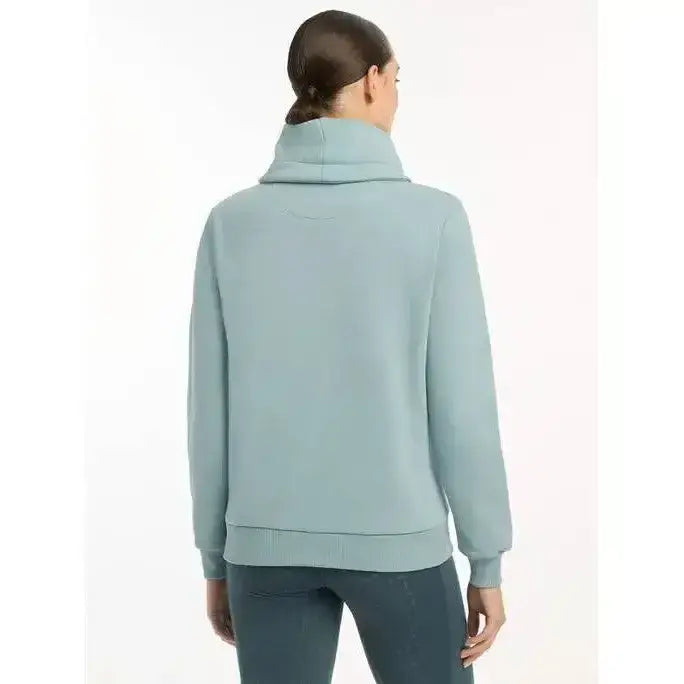 A soft mint green lemieux adele funnel neck sweat with relaxed fit and ribbed cuffs in neck sweat glacier color