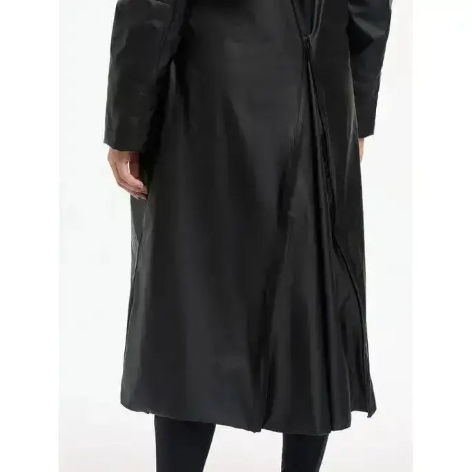 Black satin trench coat with a sleek flowing silhouette and subtle sheen from lemieux elements coat black collection