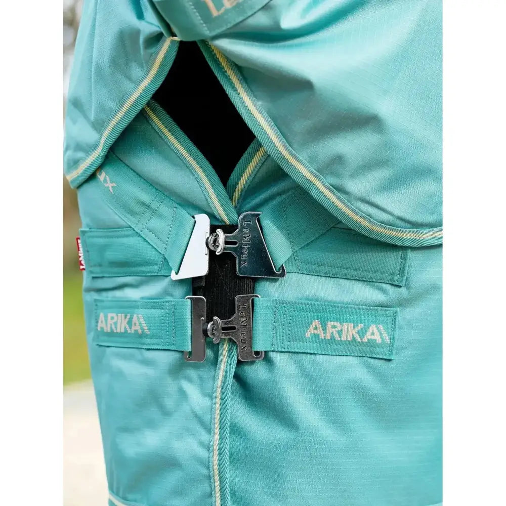 Teal lemieux arika ripstop 50g turnout rug lagoon with silver metal buckles and matching fabric straps