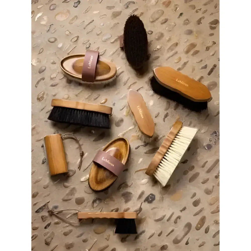 Wooden handled lemieux artisan combi body brush with natural bristles and brown leather strap is a reliable everyday brush