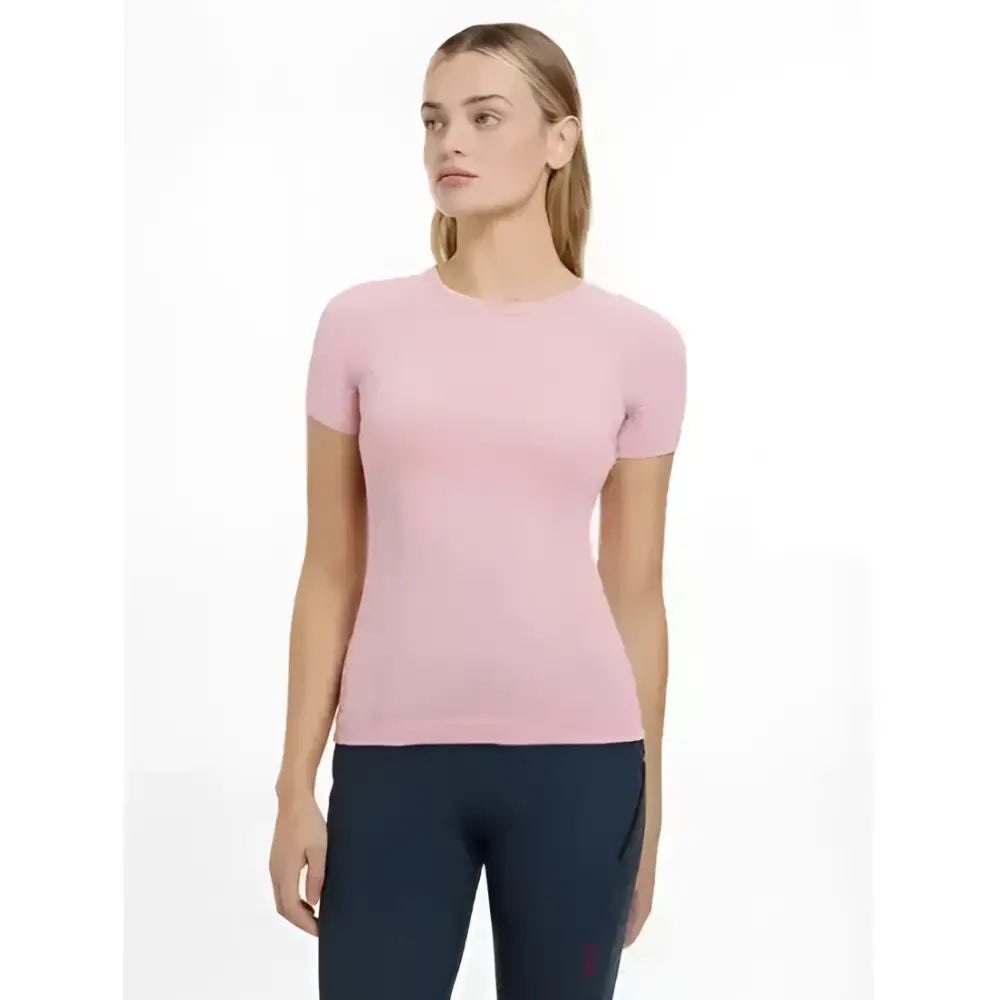 A soft pink lemieux britney seamless short sleeve top with fitted silhouette and subtle ribbed texture