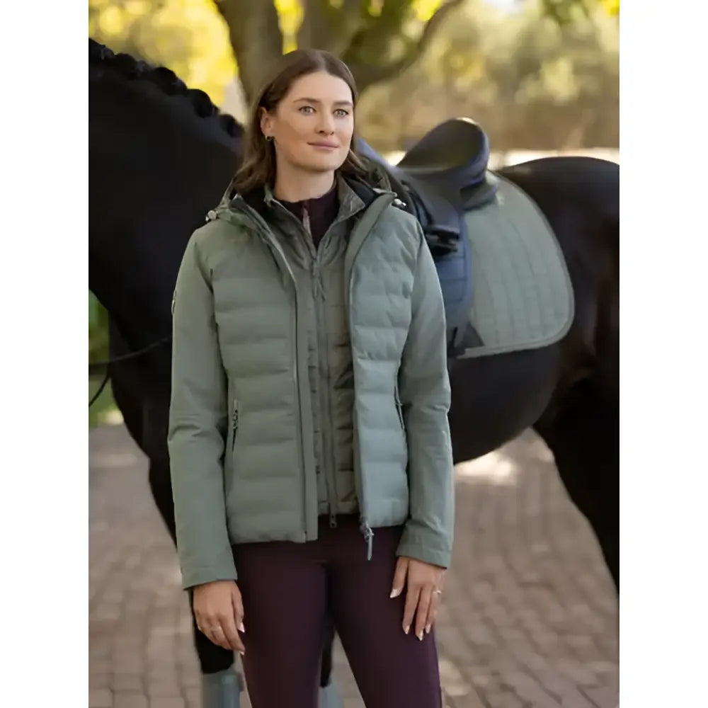 A quilted olive green lemieux brooke waterproof hybrid jacket rosemary with hood and front zipper