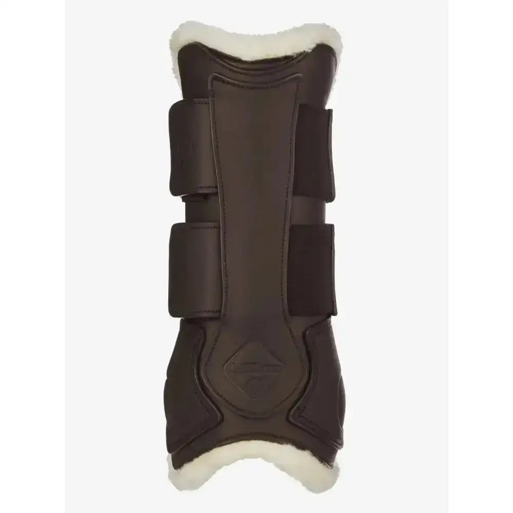 Black lemieux capella comfort tendon boot with white fleece lining and adjustable straps for cutting edge protection