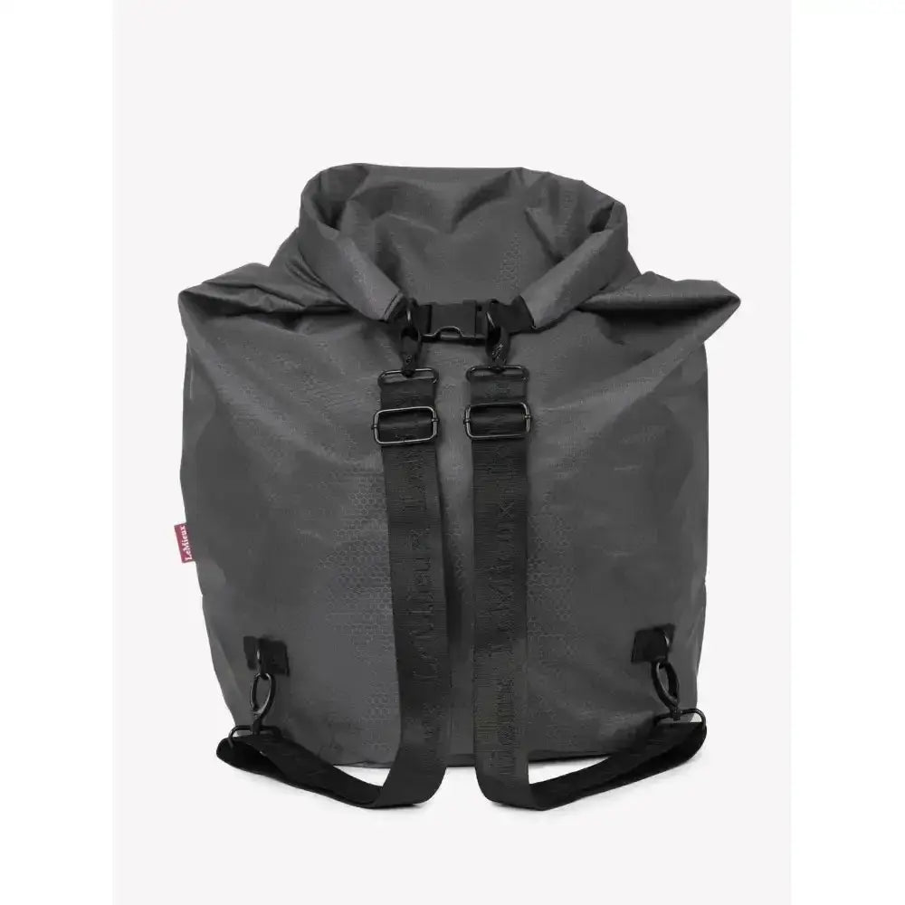 Dark gray lemieux carry roll-top backpack with black straps and buckles perfect for dirty boots and versatile laundry bag use