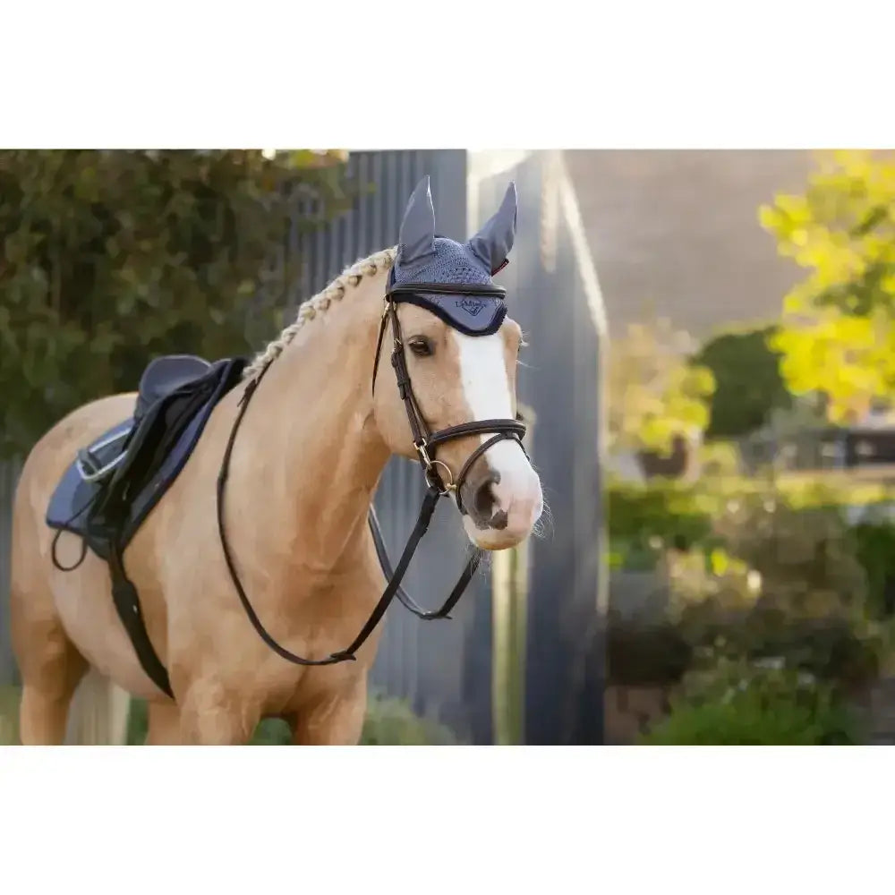 Navy blue lemieux classic fly hood with ear flaps and subtle embroidered logo in fly hood jay style