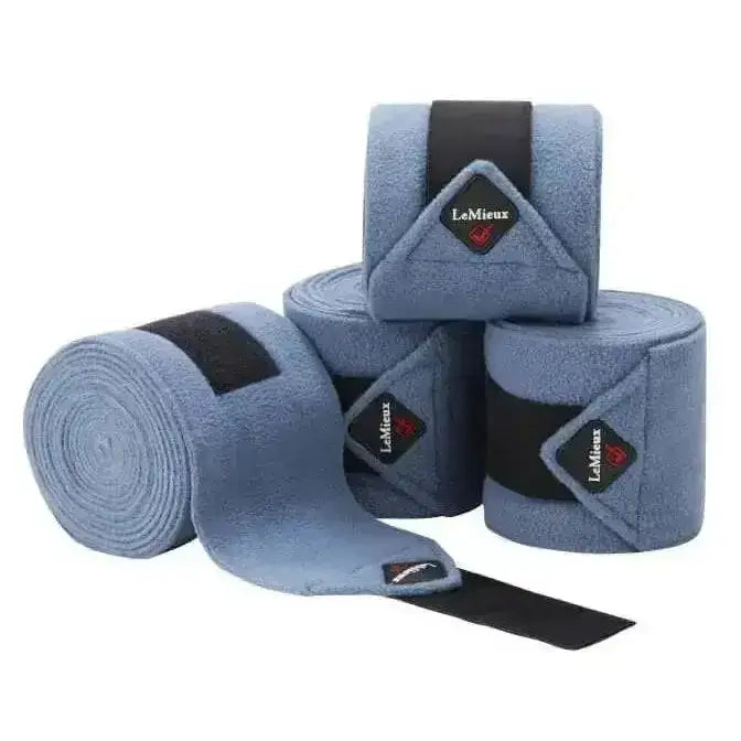 Light blue lemieux classic polo bandages with black elastic and diamond brand logos perfect for polo use