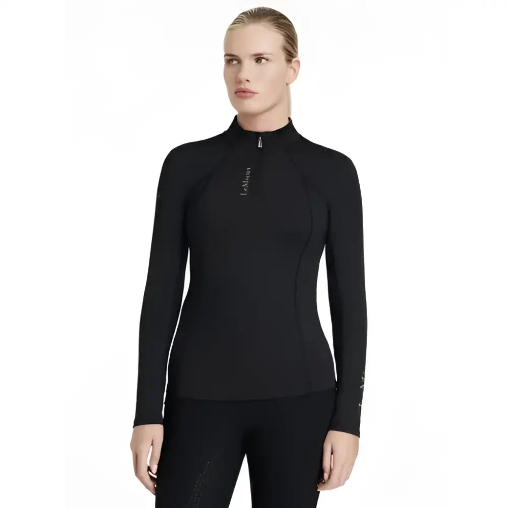 Black long sleeved performance top with high collar and subtle branding lemieux classique base layer black