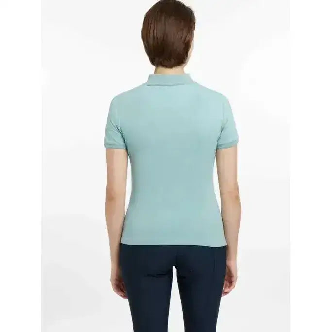 A light blue lemieux classique polo shirt aqua with short sleeves classic collar and ribbed cuffs for casual wear