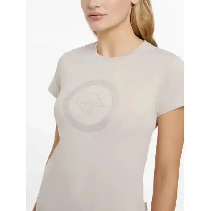 A lemieux classique stone t-shirt in soft light gray with a subtle raised circular floral design perfect for equestrian style