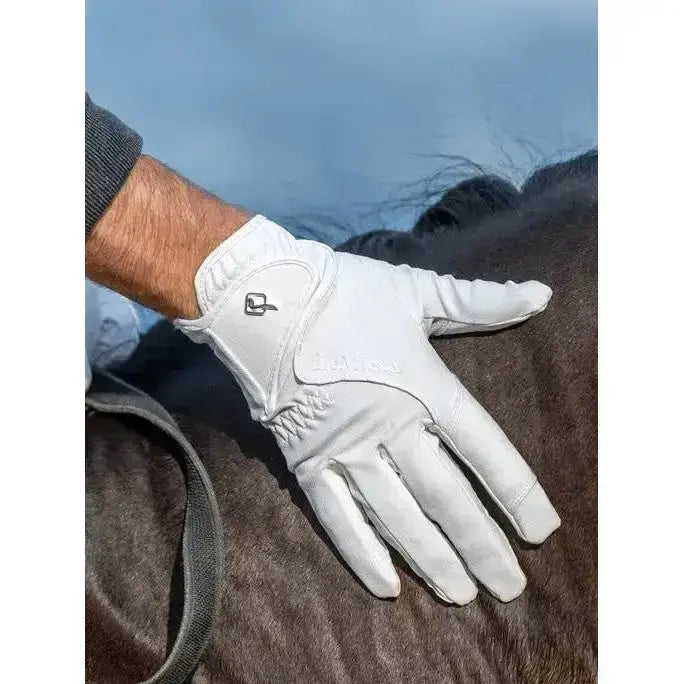 White leather lemieux close contact glove with subtle logo and double rein grip on the wrist back side view