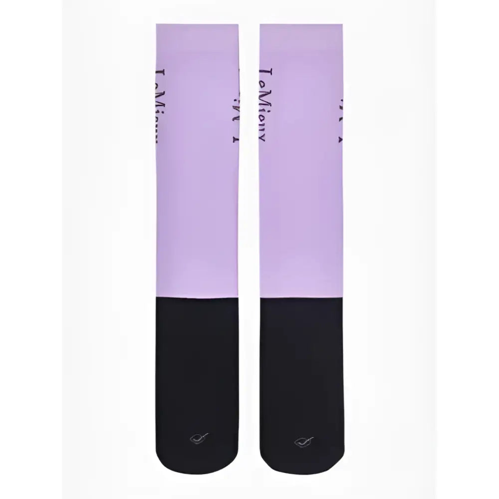 Lavender and black two-tone lemieux competition socks with im mio text on upper for stylish performance use
